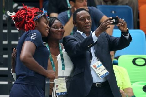 Hamane Niang takes a picture with Isabelle Yacoubou of France on day 13 of the Rio 2016 Olympic Games at Arena Carioca 2 