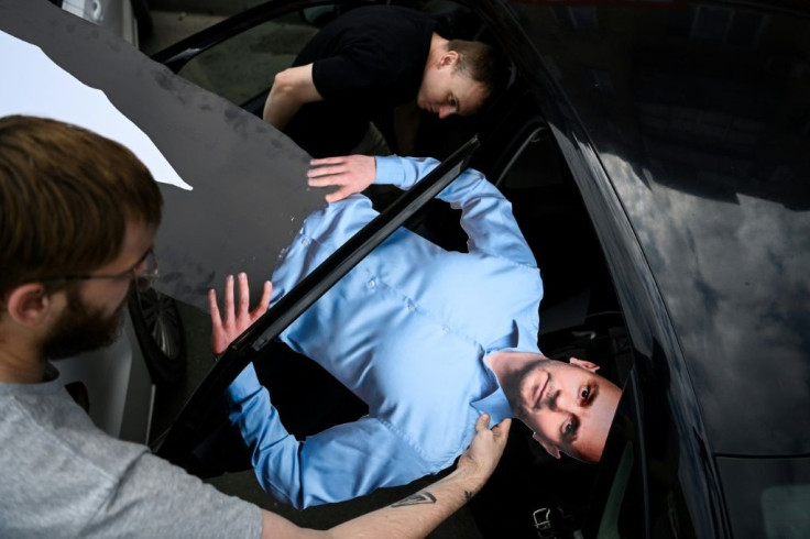 With Pivovarov jailed, his campaign staff have been hauling around a cardboard cutout of him