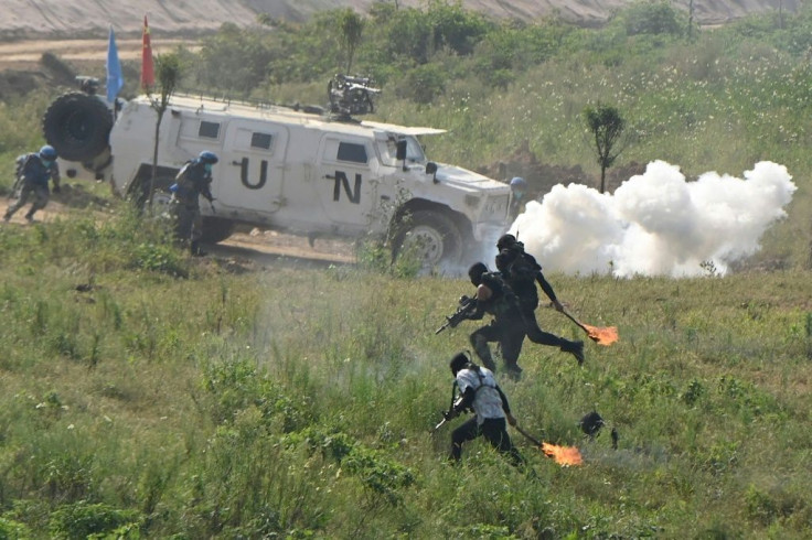 Blue-helmeted soldiers took turns role-playing various scenarios