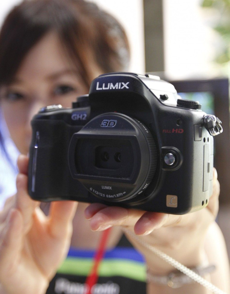 A model shows off a new Panasonic's digital camera