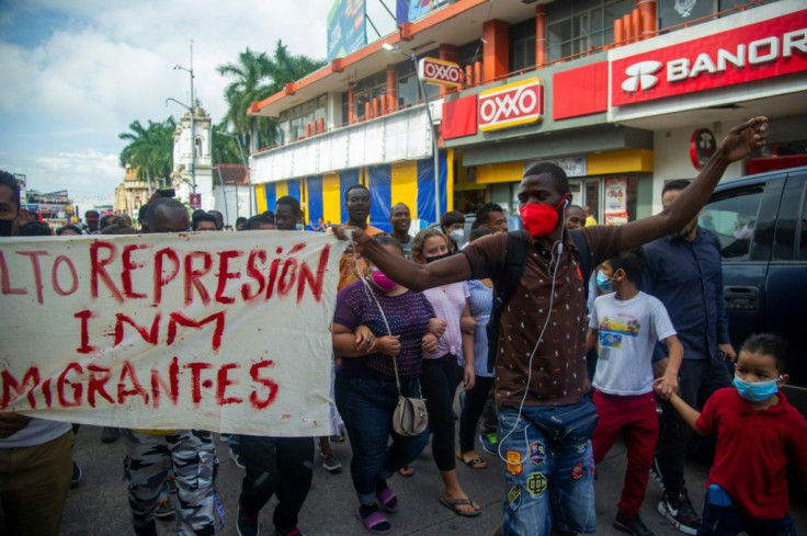 Migrants march in the southern Mexican city of Tapachula to demand the right to travel freely to the United States
