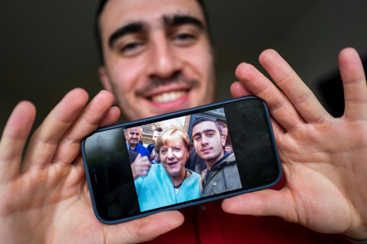 The selfie of Syrian refugee Anas Modamani with German Chancellor Angela Merkel at the height of Europe's migrant crisis in 2015 become a symbol of her generous migration policy