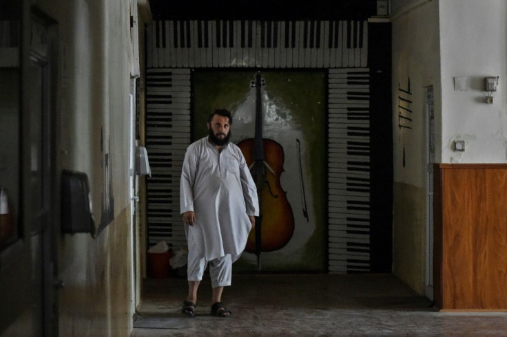 Taliban militants at the music college say they have orders to protect the instruments