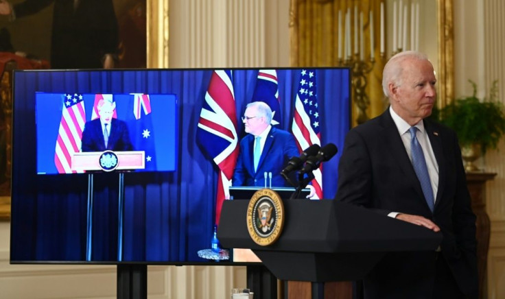 Speaking at a virtual press conference with British Prime Minister Boris Johnson (left) and US President Jow Biden, (right) Australian Prime Minister Scott Morrison (centre) announced his country was going nuclear