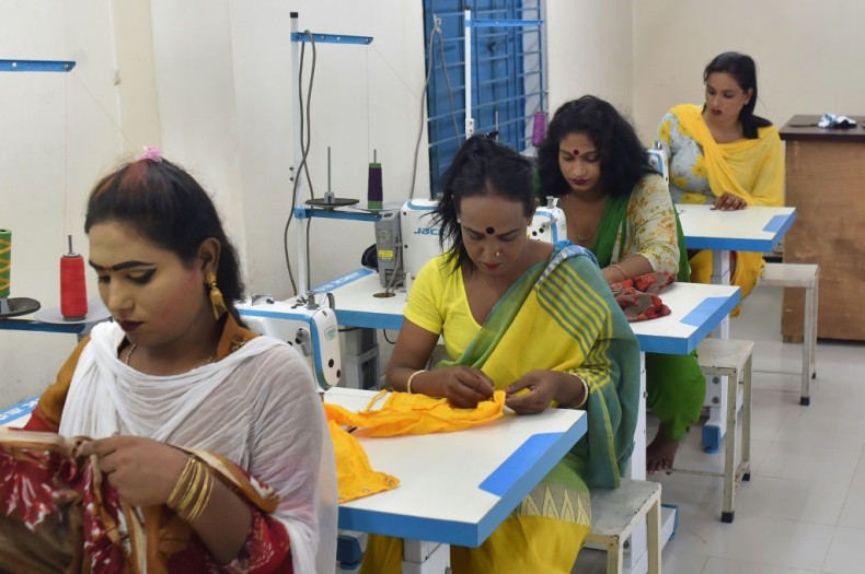 In this picture taken on June 25, 2021, transgender people work at Uttoron Fashion And Shopno Tailors garment factory owned by Apon Akhter, a transgender in Dhaka. A growing number of trans people in Bangladesh are securing formal employment as the govern