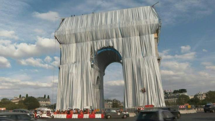 After weeks of preparation, the Arc de Triomphe in Paris is nearly fully wrapped in fabric, in a tribute to late artist Christo. The monument is being covered in 25,000 square metres (270,000 square feet) of fabric -- the signature of the Bulgarian-born a