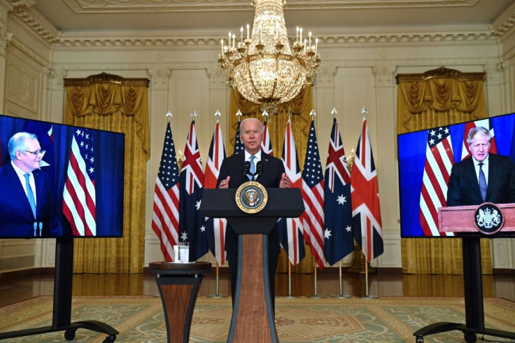 US President Joe Biden announces a three-way alliance with British Prime Minister Boris Johnson (left) and Australian Prime Minister Scott Morrison at the White House on September 15, 2021