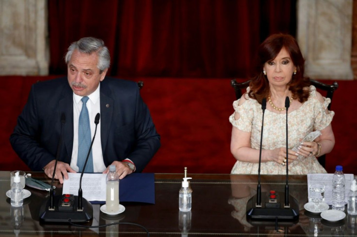 Argentina's President Alberto Fernandez and Vice President Cristina Kirchner, shown here in Buenos Aires in March 2021, are in a face-off after a recent electoral loss