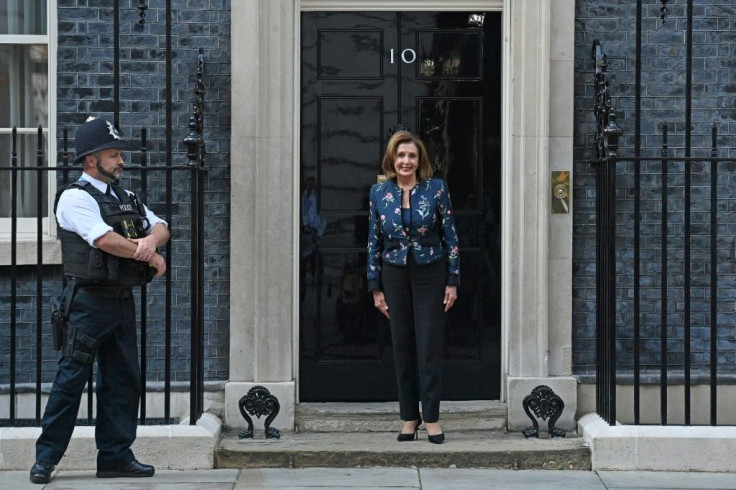 Nancy Pelosi, Speaker of the US House of Representatives, posed for media outside of 10 Downing Street on Thursday as she arrived for a meeting with Britain's Prime Minister Boris Johnson