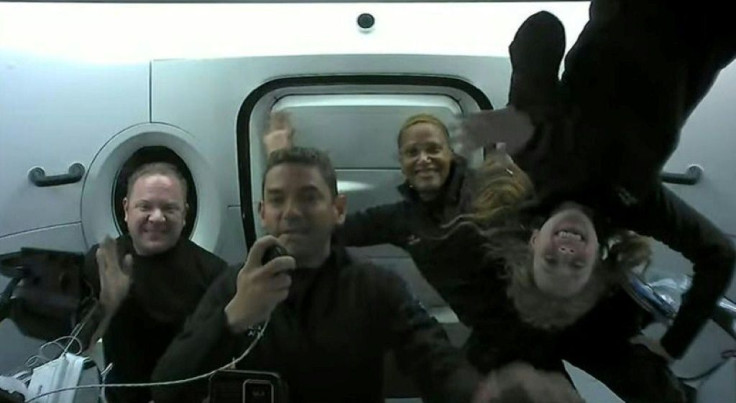 A screengrab from the SpaceX live webcast shows Inspiration4 crew (from L) Chris Sembroski, Jared Isaacman, Sian Proctor and Hayley Arceneaux