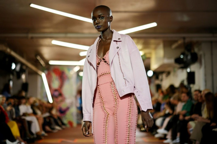 A model presents a creation from British designer Mark Fast's Spring/Summer 2022 collection on the first day of London Fashion Week in London on Friday