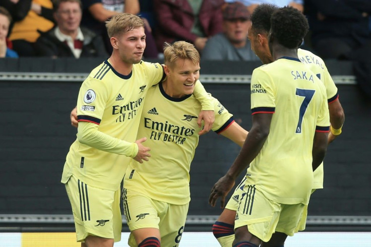 Martin Odegaard (centre) celebrates after scoring for Arsenal against Burnley