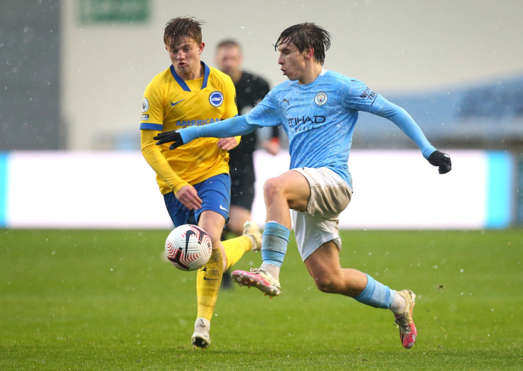 Adrian Bernabe of Manchester City U23 beats Sam Packham of Brighton and Hove Albion U23