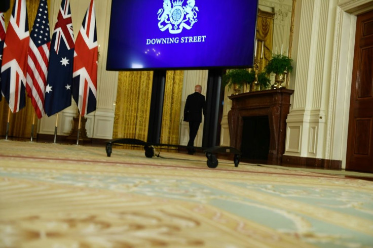 US President Joe Biden leaves after a virtual press conference on national security with British Prime Minister Boris Johnson and Australian Prime Minister Scott Morrison in the East Room of the White House in Washington, DC, on September 15, 2021