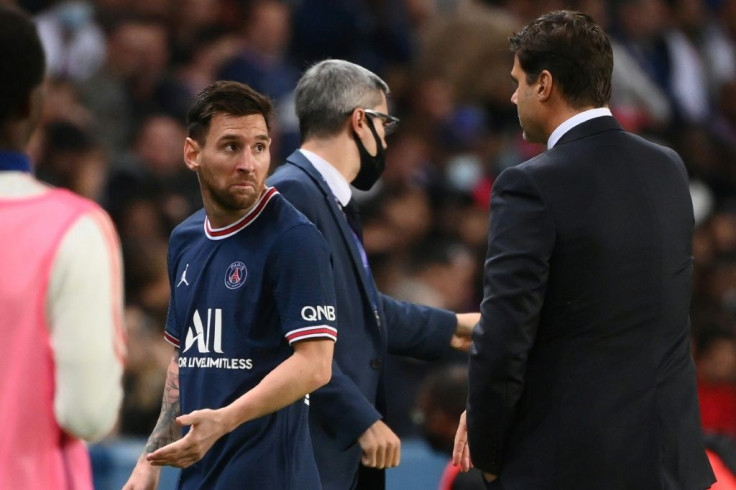 Lionel Messi didn't appear too happy with coach Mauricio Pochettino as he came off in the second half against Lyon