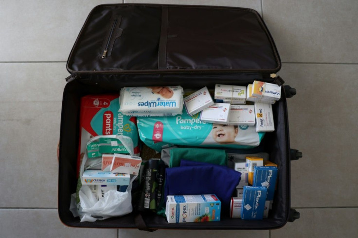 Lebanese expats pack their luggage with supplies including medicine each time they travel to their home country, which is running out of everything