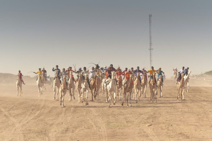 Moussa, 10, won glory aboard his camel Mahokat -- or 'the madman'