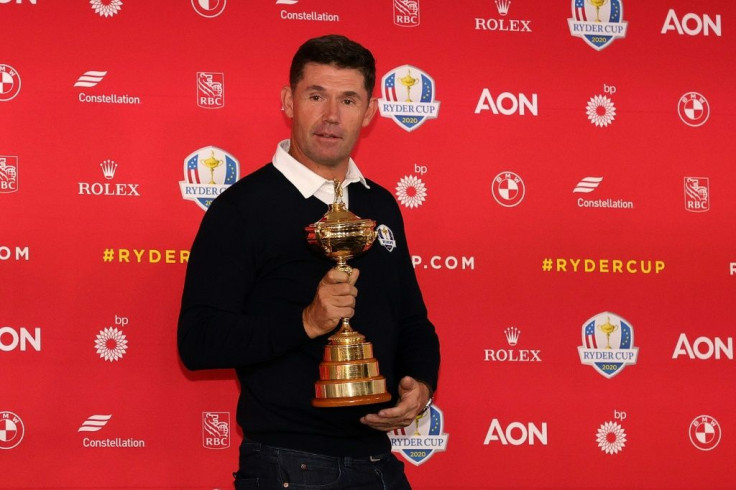 European Ryder Cup captain Padraig Harrington holds the trophy that Europe won in France in 2018, the same one that will be up for grabs when the Ryder Cup begins Friday at Whistling Straits