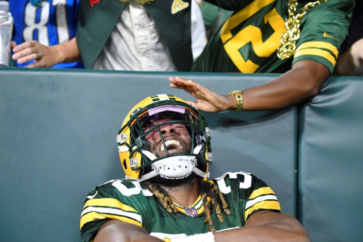 Green Bay Packers Aaron Jones shone in the first regular-season game with a packed house at Lambeau Field since the death of his father from Covid-19