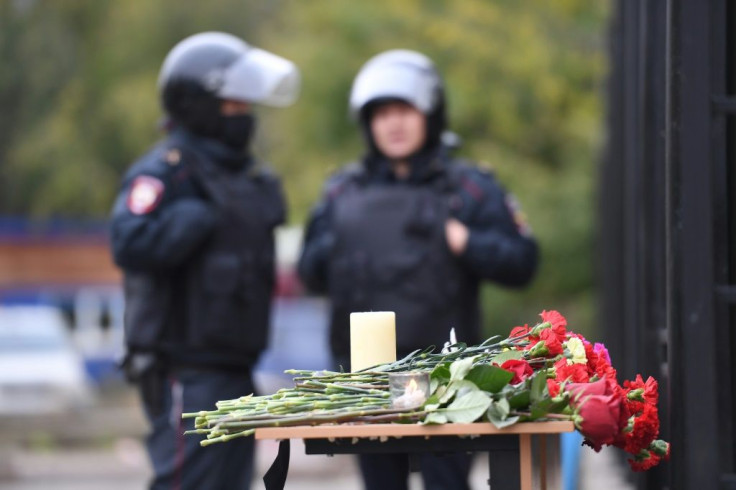 There was still a heavy police cordon around Perm State University a day after the killings