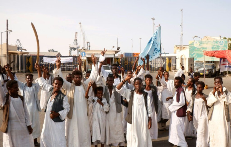 Demonstrators unhappy with parts of a 2020 peace deal with ethnic minority rebels gather outside the docks in Port Sudan on Monday, one of a string of protests against the transitional  government's policies in recent months