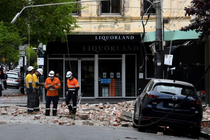 In the popular shopping area around the city's Chapel Street, masonry debris tumbled from buildings and littered the roads