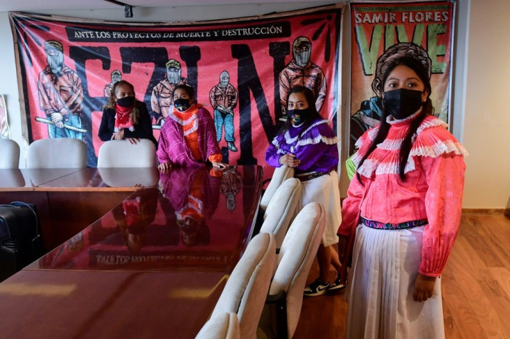 Mexican woman from the Otomi indigenous community are seen in the occupied  National Institute of Indigenous Peoples building in Mexico City