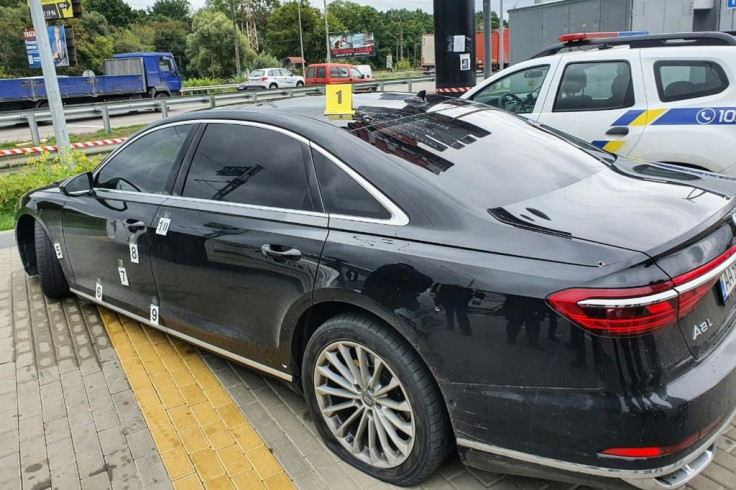 Photos published by officials showed a black Audi with bullet holes along its bonnet and on the driver-side door