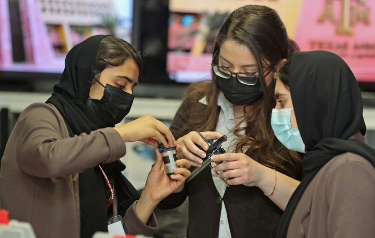 The nine members of an all-girl Afghan robotics team evacuated from Kabul to Qatar have acquired star status and captured hearts since fleeing their homeland