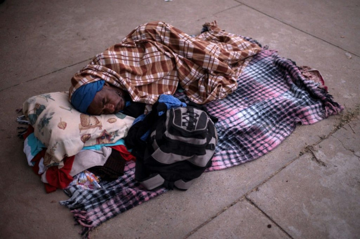 A Haitian migrant rests in Ciudad Acuna near the Mexican-US border