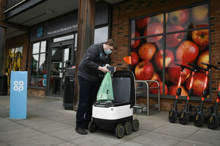 Bags of shopping are packed into the robot when an order is made