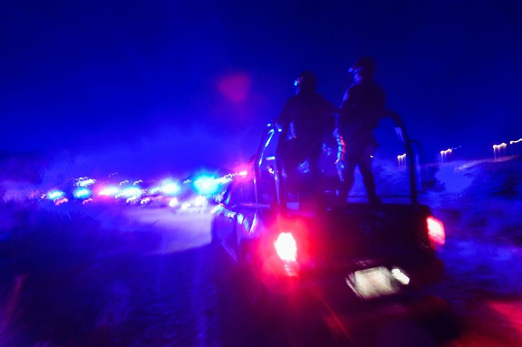 Mexican police patrol near the Rio Grande river in Ciudad Acuna in northern Mexico where Haitian migrants are camped out hoping to enter the United States