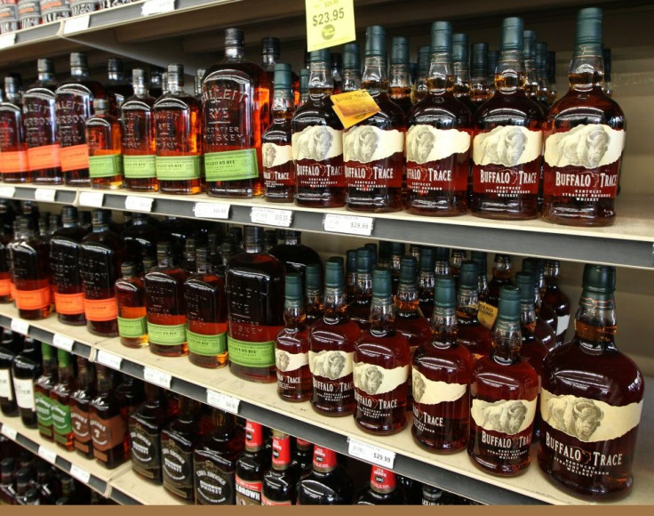 Bourbon bottles are seen on a liquor store shelf in Louisville, Kentucky in June 2018