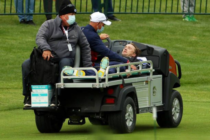 Tom Felton is carted off the course after collapsing during the celebrity matches ahead of the 43rd Ryder Cup at Whistling Straits on September 23, 2021 in Kohler, Wisconsin. (Photo by Andrew Redington/Getty Images)