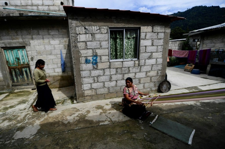 The indigenous weavers of Zinacantan in southern Mexico use traditional backstrap looms to produce their colorful fabrics