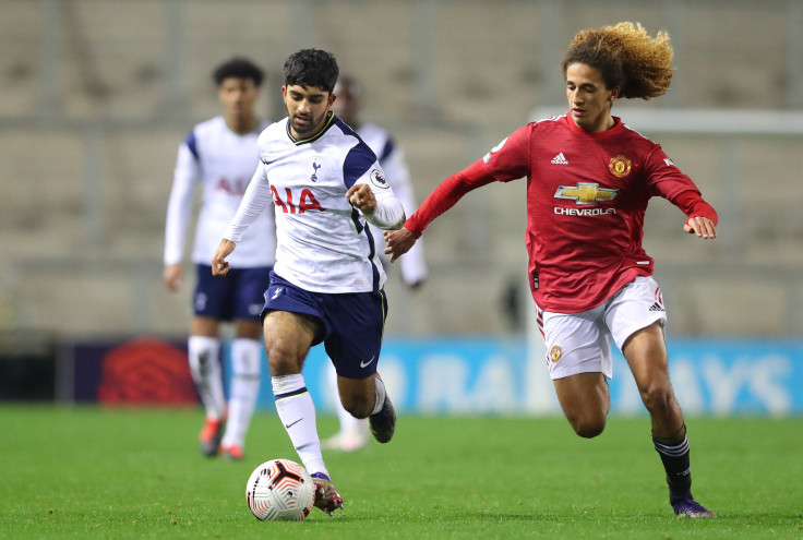 Dilan Markanday of Tottenham Hotspur beats Hannibal Mejbri of Manchester United