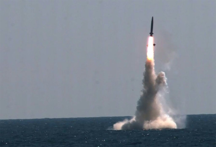North Korea said it was 'illogical' of the South to test a submarine launched ballistic missile while condemning the North's missile test as a threat to peace