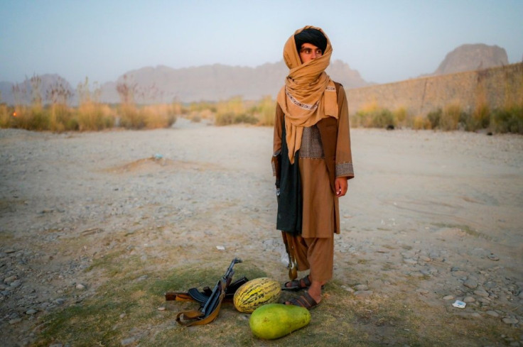 The young Taliban under the bridge have come here to relax before they head back to Kandahar