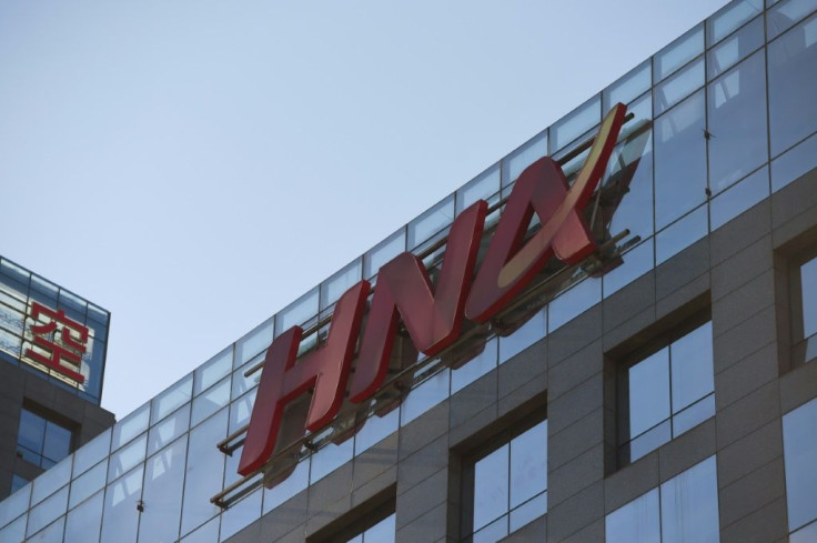 Two top executives of China's HNA Group have been detained