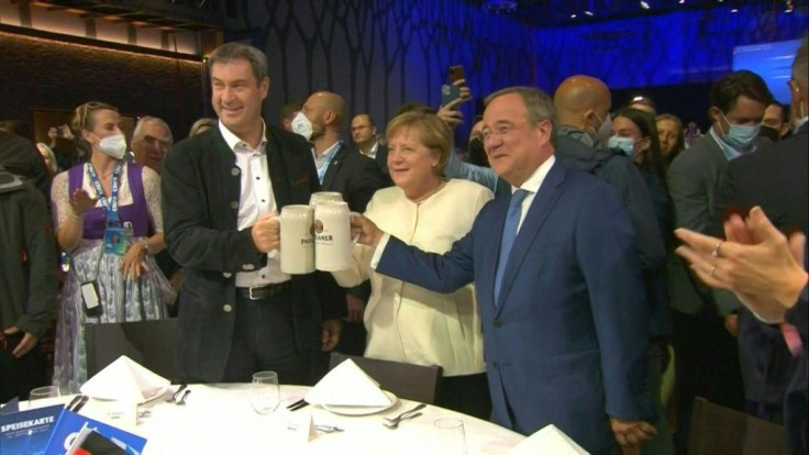 IMAGES German Chancellor Angela Merkel attends the final rally ahead of the September 26th elections for CDU candidate Armin Laschet. The election on Sunday will mark the end of Merkel's 16 years in power and the beginning of a rare period of unpredictabi