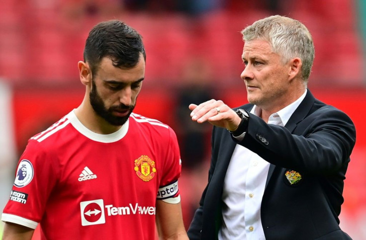 Manchester United boss Ole Gunnar Solskjaer consoles Bruno Fernandes after he missed a penalty in United's 1-0 defeat by Aston Villa