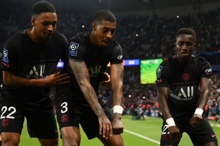 PSG players celebrate after Idrissa Gana Gueye (R) put them ahead against Montpellier