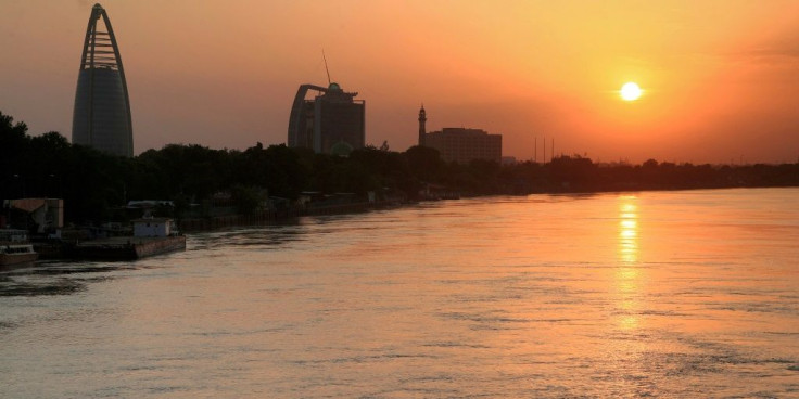 The Greater Nile Petroleum Oil Company (GNPOC) Tower and PetroDar Operating Company (PDOC) Tower (left to right) near the Blue Nile riverfront in Sudan's capital Khartoum at sunset