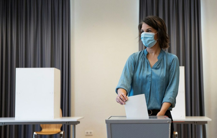 Greens chancellor candidate Annalena Baerbock casts her ballot at a polling station in Potsdam