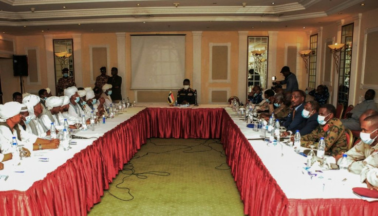 Shams al-Din Kabashi (C), of Sudan's ruling Sovereign Council, meets with protest leaders in Port Sudan, where demonstrations threaten the impoverished country's fuel supplies and revenue
