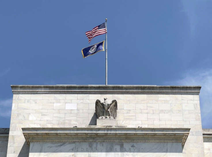 Amid public scrutiny of their stock trading activities, two senior Fed officials announced their retirement