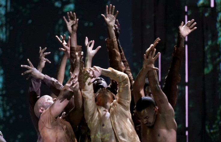 Dancers perform a scene during a rehearsal for Terence Blanchard's "Fire Shut Up in My Bones"