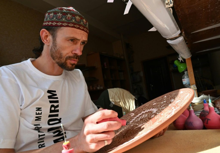 Ceramics artist Rustem Skybin is among thousands of ethnic Tatars to have fled Crimea for mainland Ukraine since 2014