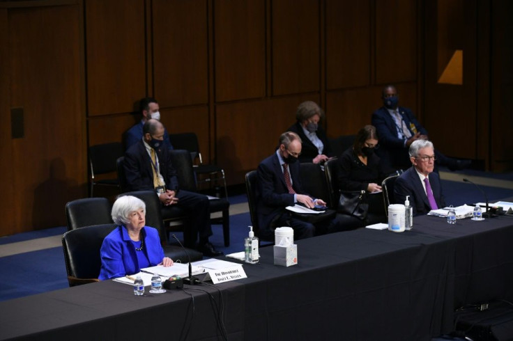 Treasury Secretary Janet Yellen (left), and Federal Reserve Board Chairman Jerome Powell (right) testify during a Senate Banking, Housing and Urban Affairs Committee hearing in Washington, DC on September 28, 2021