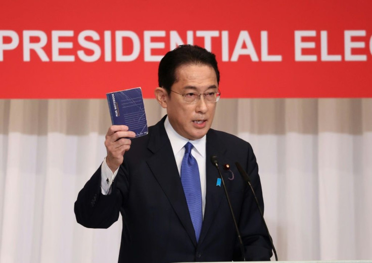 Former LDP policy chief Fumio Kishida carries around a notebook with suggestions from the public